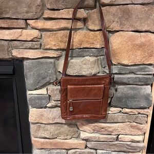 Gaini Bernini Brown Bag with brown lining multiple‎ pockets. Size 10”X 10“.